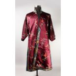 A 19TH / 20TH CENTURY CHINESE SILK LADIES EMBROIDERED ROBE, finely detailed with colourful floral