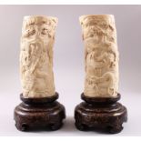 A PAIR OF GOOD JAPANESE MEIJI PERIOD CARVED IVORY TUSK VASES, both deeply and finely carved to