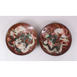A PAIR OF JAPANESE MEIJI PERIOD CLOISONNE DRAGON CHARGERS, a gold dust ground with two intertwined