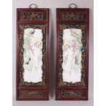 A PAIR OF CHINESE PAINTED PORCELAIN PANELS IN HARDWOOD FRAMES, each panel depicting tranquil