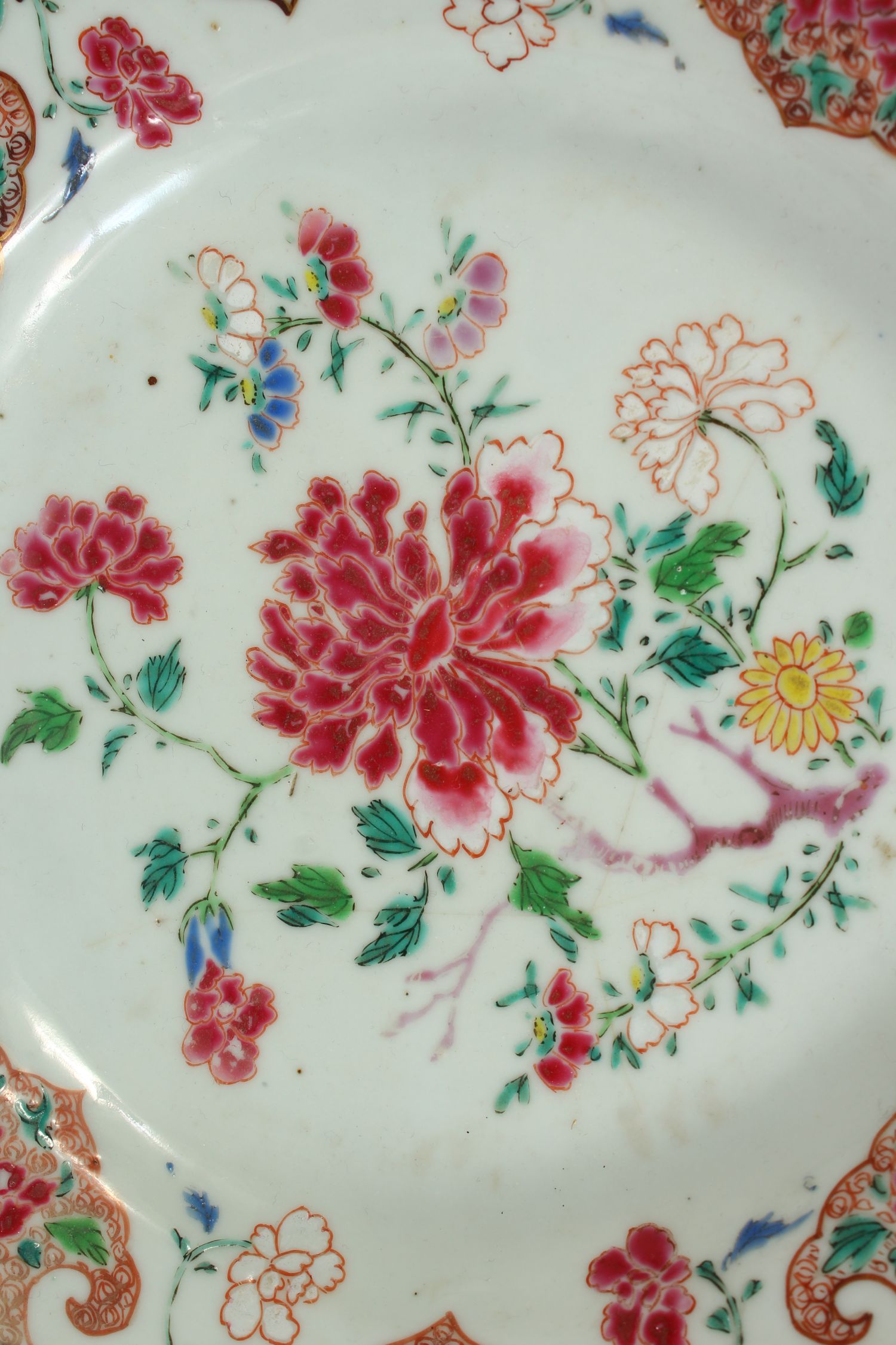 AN 18TH CENTURY CHINESE FAMILLE ROSE PORCELAIN PLATE, painted to its centre with peony and other - Image 2 of 4