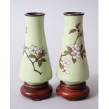 A PAIR OF JAPANESE MEIJI PERIOD SILVER WIRE CLOISONNE VASES & HARDWOOD STANDS, the vases of an