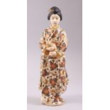 A GOOD JAPANESE MEIJI PERIOD SATSUMA PORCELAIN FIGURE OF A GEISHA GIRL, stood wearing traditional