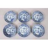 A SET OF SIX 19TH CENTURY CHINESE BLUE & WHITE SAUCERS, each decorated with scenes of figures within