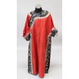 A GOOD 19TH CENTURY CHINESE RED SILK EMBROIDERED MOUNTAIN / COURT ROBE, the fine embroidered robe