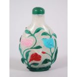 AN 18TH CENTURY CHINESE FIVE COLOUR OVERLAY BUBBLE SUFFUSED GLASS SNUFF BOTTLE, Decorated in pink,