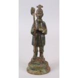 A GOOD CHINESE HAN DYNASTY BRONZE FIGURE OF A SOLDIER, stood holding his halberd, the base with a