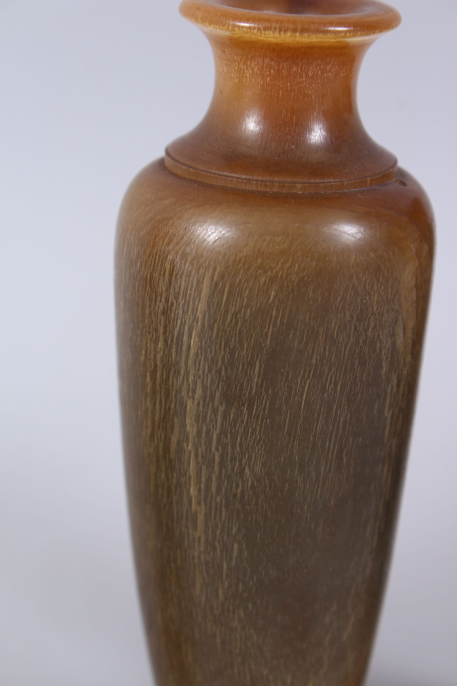 A GOOD GARNITURE OF THREE RHINO HORN TURNED VASES ON STANDS, 12cm x 11cm high. Weight 234gms. - Image 3 of 6