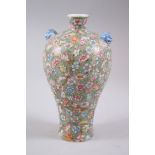 A LATE 19TH EARLY 20TH CENTURY CHINESE FAMILLE ROSE MILLEFLEUR PORCELAIN VASE, decorated in the