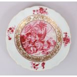 A GOOD 19TH CENTURY CHINESE PORCELAIN PLATE, decorated with figures seated within a garden