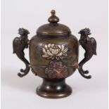 A JAPANESE MEIJI PERIOD BRONZE & MIXED METAL KORO & COVER, with phoenix handles and scenes of