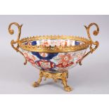 A GOOD JAPANESE MEIJI PERIOD IMARI BOWL WITH ORMOLU MOUNTS, decorated in the traditional floral