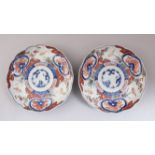 A PAIR OF 19TH CENTURY JAPANESE IMARI LOBED PORCELAIN PLATES, decorated with traditional imari