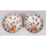 A PAIR OF JAPANESE MEIJI PERIOD IMARI PORCELAIN PLATES, finely painted with scenes of phoenix &