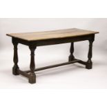 AN 18TH CENTURY OAK REFECTORY STYLE DINING TABLE, with plank top, plain frieze on baluster turned