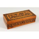 A GOOD TUNBRIDGE WARE RECTANGULAR BOX, with bands of floral inlay. 24cms long.