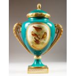A GOOD ENGLISH TWO HANDLED URN & COVER painted with reverse panels of birds and flowers. 35cms