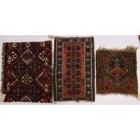 THREE SMALL PERSIAN RUGS, various sizes.