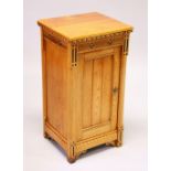 IN THE MANNER OF CHARLES BEVAN, AN ARTS & CRAFTS GOTHIC REVIVAL ASH BEDSIDE CUPBOARD, with ebony and