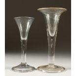 TWO GEORGIAN WINE GLASSES with tear drops. 17cms and 15cms high.