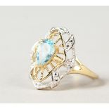 A 9CT GOLD, BLUE TOPAZ AND DIAMOND RING.