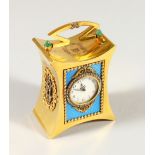 A VERY GOOD RUSSIAN GOLD AND ENAMEL DECORATED MINIATURE CLOCK, with a circular dial, diamond set