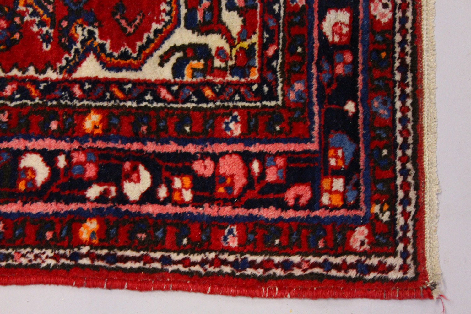 A PERSIAN RUG, red ground with central motif and similar border. 150cms x 105cms. - Image 2 of 7