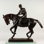 A SUPERB LARGE BRONZE, HORSE AND JOCKEY, on a rectangular base. 55cms high x 58cms long.