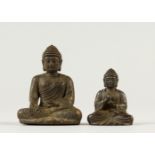 TWO SMALL BRONZE BUDDHAS. 3.5cms and 5cms high.