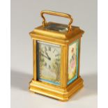 A MINIATURE BRASS CARRIAGE CLOCK, with Sevres style panels. 9cms high.