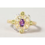 A 9CT GOLD, AMETHYST, PERIDOT AND DIAMOND RING.