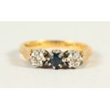 AN 18CT GOLD, DIAMOND AND SAPPHIRE THREE STONE RING.