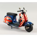 A TIN VESPA, painted with The Union Jack. 29cms long.