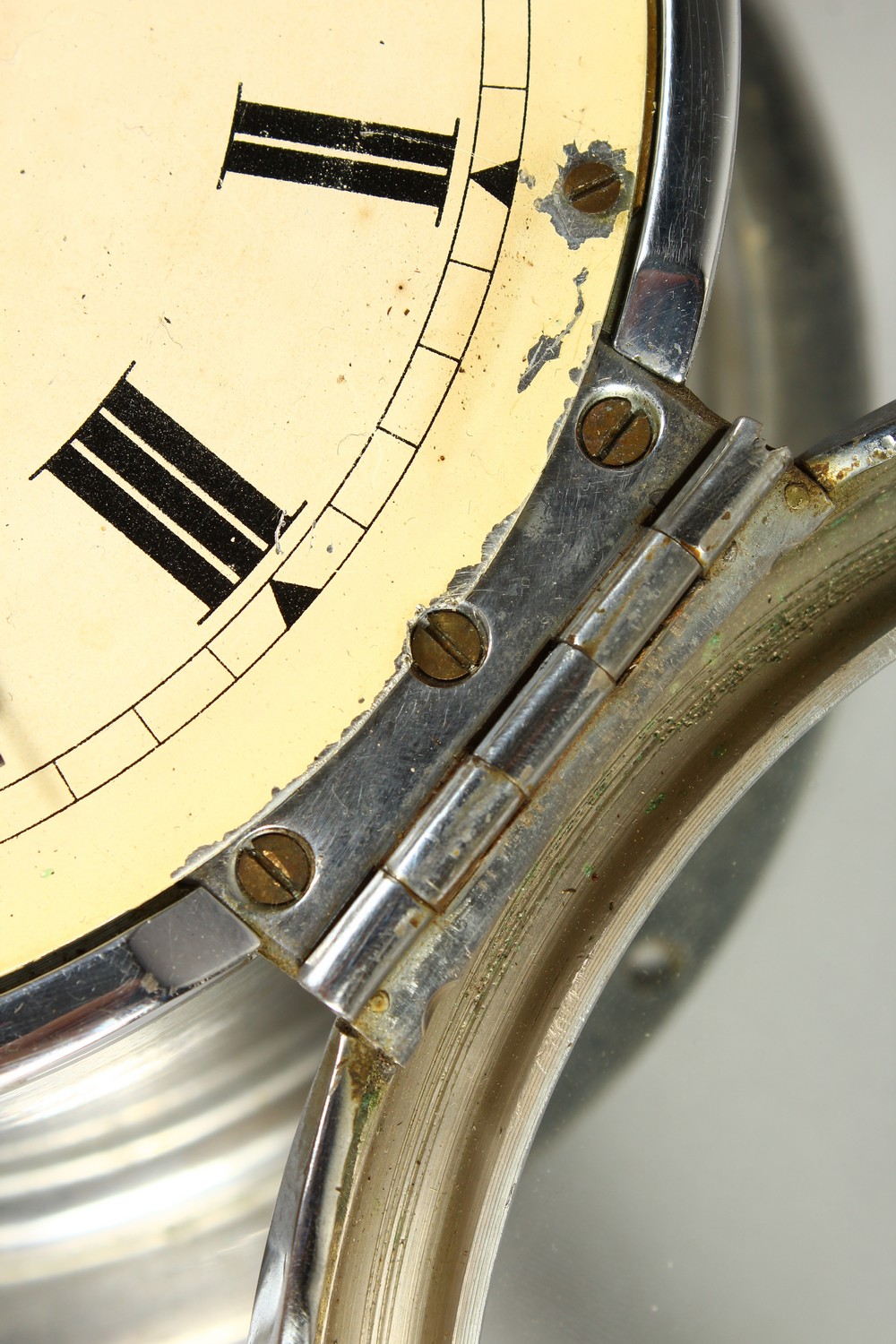 AN EARLY 20TH CENTURY NICKEL PLATED CIRCULAR WALL CLOCK, chiming on the hour, cream enamel dial with - Image 6 of 8