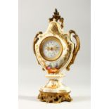 A SMALL PORCELAIN AND ORMOLU MANTLE CLOCK, in the French taste. 28cms high.