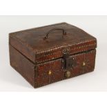 A VERY GOOD EARLY 18TH CENTURY LEATHER CASE studded with brass, with iron lock and carrying