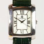 A BAUME & MERCIER WRISTWATCH with leather strap.