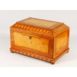 A LARGE SHERATON MANNER INLAID BOX, mirror inside the lid, inlaid in coloured woods, on bun feet.