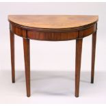 A GEORGIAN MAHOGANY DEMI-LUNE FOLDOVER CARD TABLE, with plain frieze on tapering square legs.