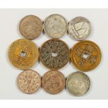 A BAG OF NINE ASSORTED CHINESE COINS.