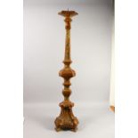 A LARGE ITALIAN 18TH CENTURY PRICKET CANDLESTICKS in wood with mirrored panels. 120cms high.