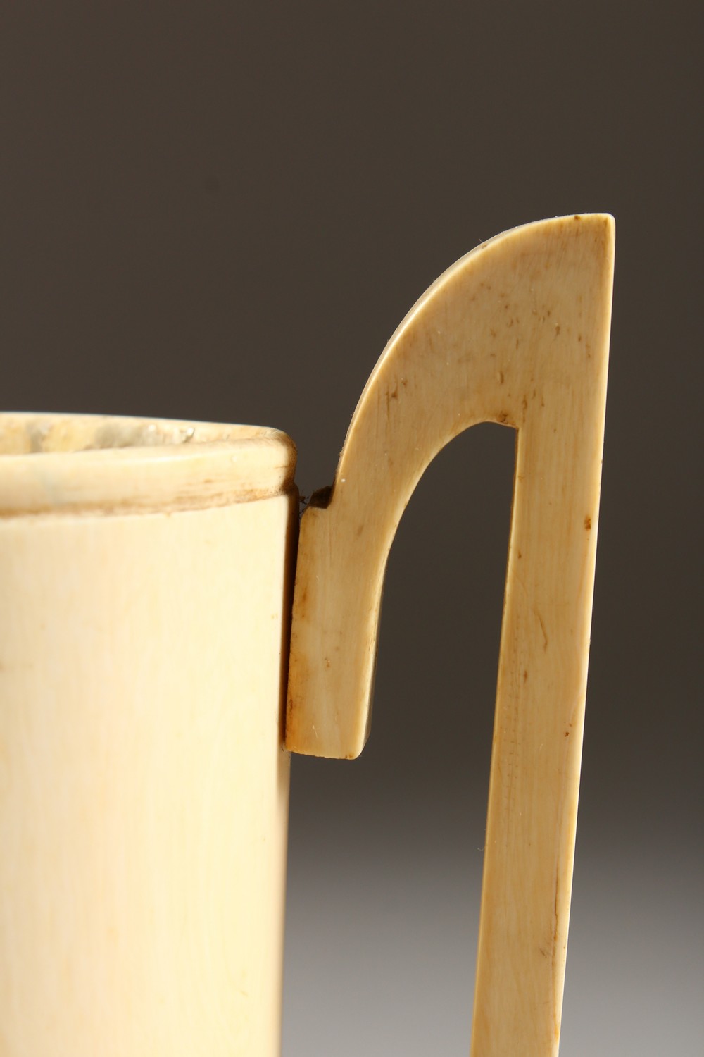 AN IVORY TWO HANDLED TUSK VASE. 7ins high. - Image 2 of 6