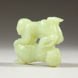 A CHINESE JADE CARVING OF TWO BOYS. 5.5cms wide.