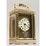 A CHARLES FRODSHAM SILVER CASED CARRIAGE CLOCK. 725cms high.