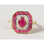 A 9CT GOLD DECO STYLE RUBY AND DIAMOND RING.