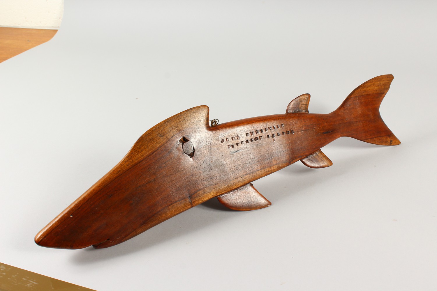 A PITCAIRN ISLAND CARVED WOOD SHARK by JOHN CHRISTIAN. Signed. 50cms long. - Image 6 of 7
