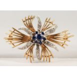 AN 18CT GOLD, SAPPHIRE AND DIAMOND BROOCH.