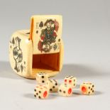 A BONE GAMING BOX, containing dice. 3.5cms wide.