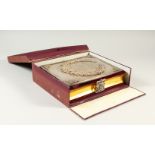 AN UNUSUAL RUSSIAN SILVER PHOTOGRAPH ALBUM, the cover with matted ground engraved with initials