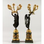 A SUPERB LARGE PAIR OF THOMAS HOPE DESIGN BRONZE AND ORMOLU CANDELABRA, formed asa brass winged